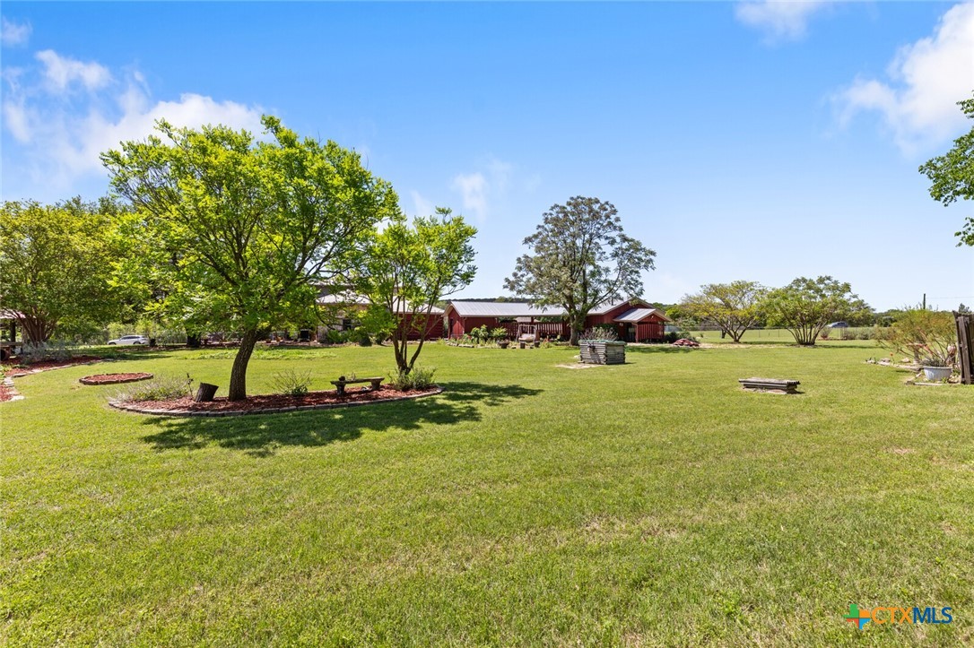 1024 Backstrom Crossing Belton, TX 76513 - Photo 47 of 47 a swimming pool with trees in the background
