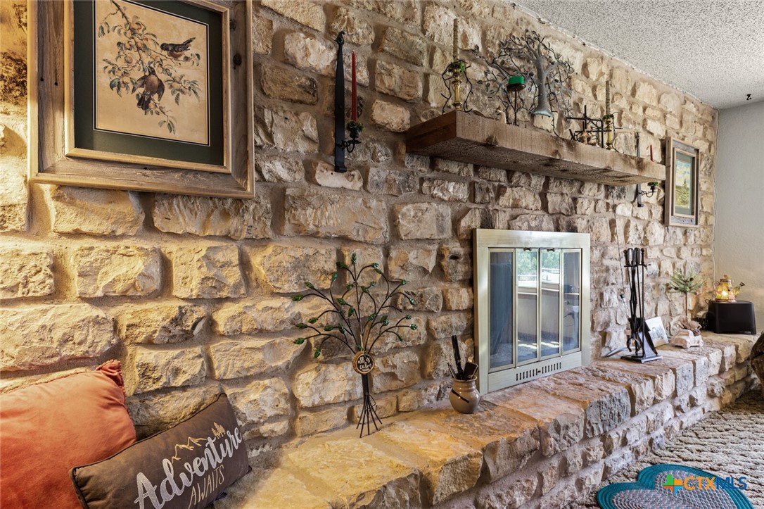 1024 Backstrom Crossing Belton, TX 76513 - Photo 7 of 47 a bedroom with a bed and a painting on the wall