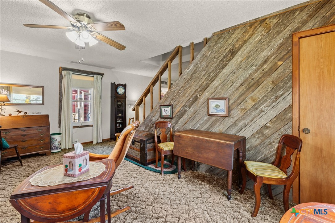 1024 Backstrom Crossing Belton, TX 76513 - Photo 10 of 47 a living room with furniture a rug and a window