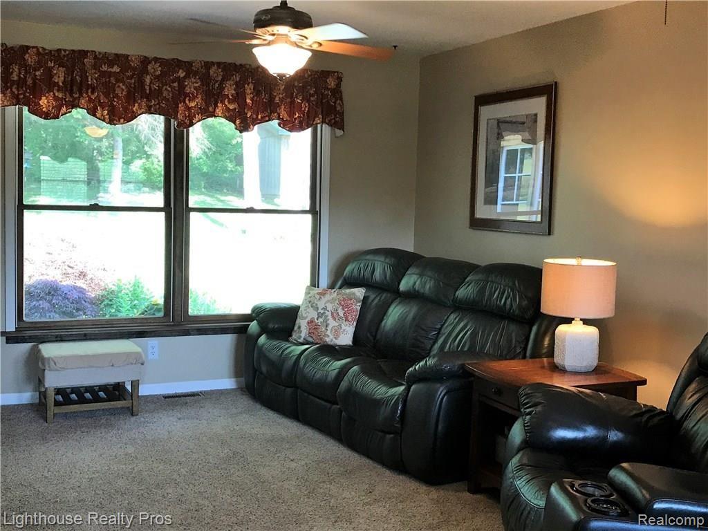 7150 Denton Hill Road Fenton, MI 48430 - Photo 11 of 47 Huge family room with great views to the back yard