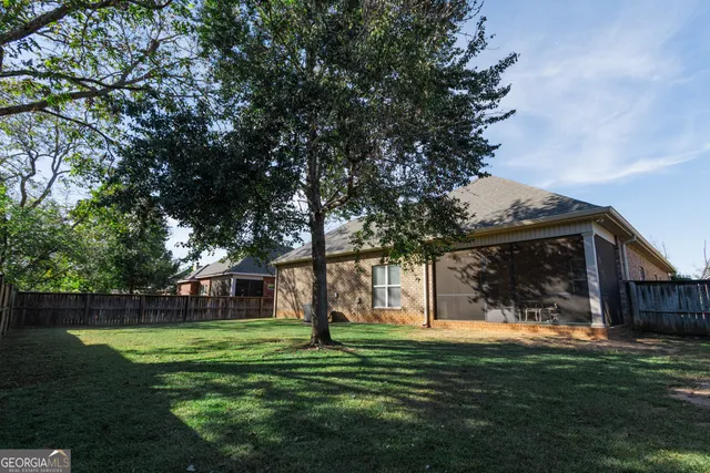 a view of a house with a big yard