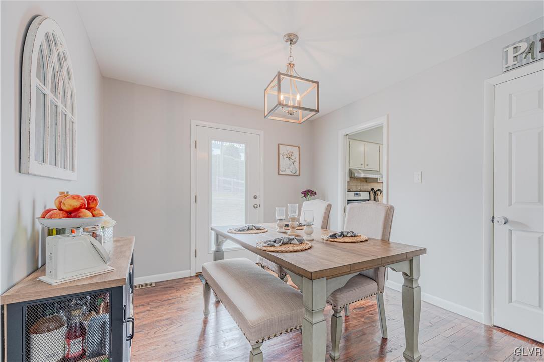 413 South Miller Street Shillington, PA 19607 - Photo 11 of 36 a view of a dining room with furniture and wooden floor