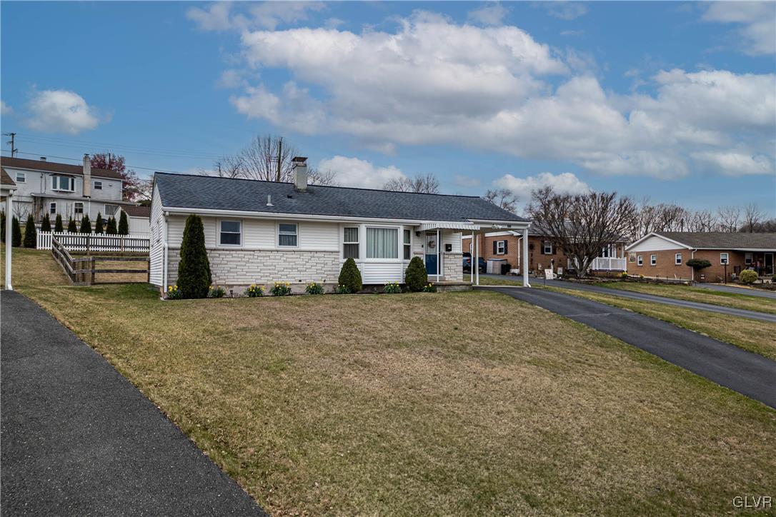 413 South Miller Street Shillington, PA 19607 - Photo 19 of 36 a front view of a house with a garden