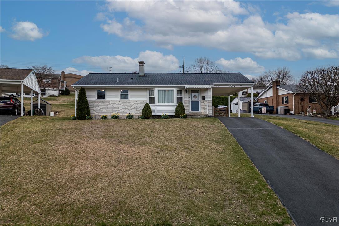 413 South Miller Street Shillington, PA 19607 - Photo 20 of 36 a view of a big house with a big yard and large trees