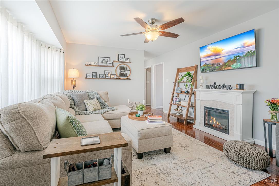 413 South Miller Street Shillington, PA 19607 - Photo 2 of 36 a living room with furniture and a fireplace