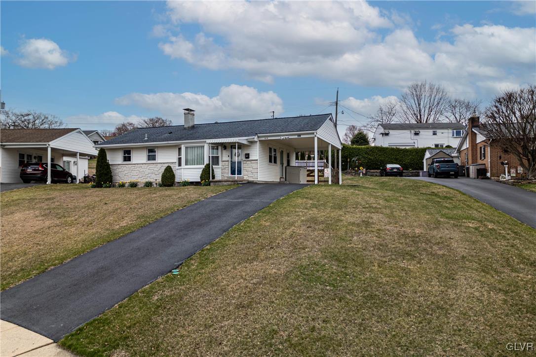 413 South Miller Street Shillington, PA 19607 - Photo 21 of 36 a view of a big house with a big yard and large trees