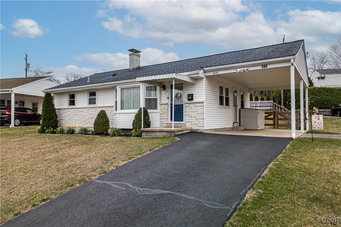 413 South Miller Street Shillington, PA 19607 - Photo 22 of 36 front view of a house with a patio