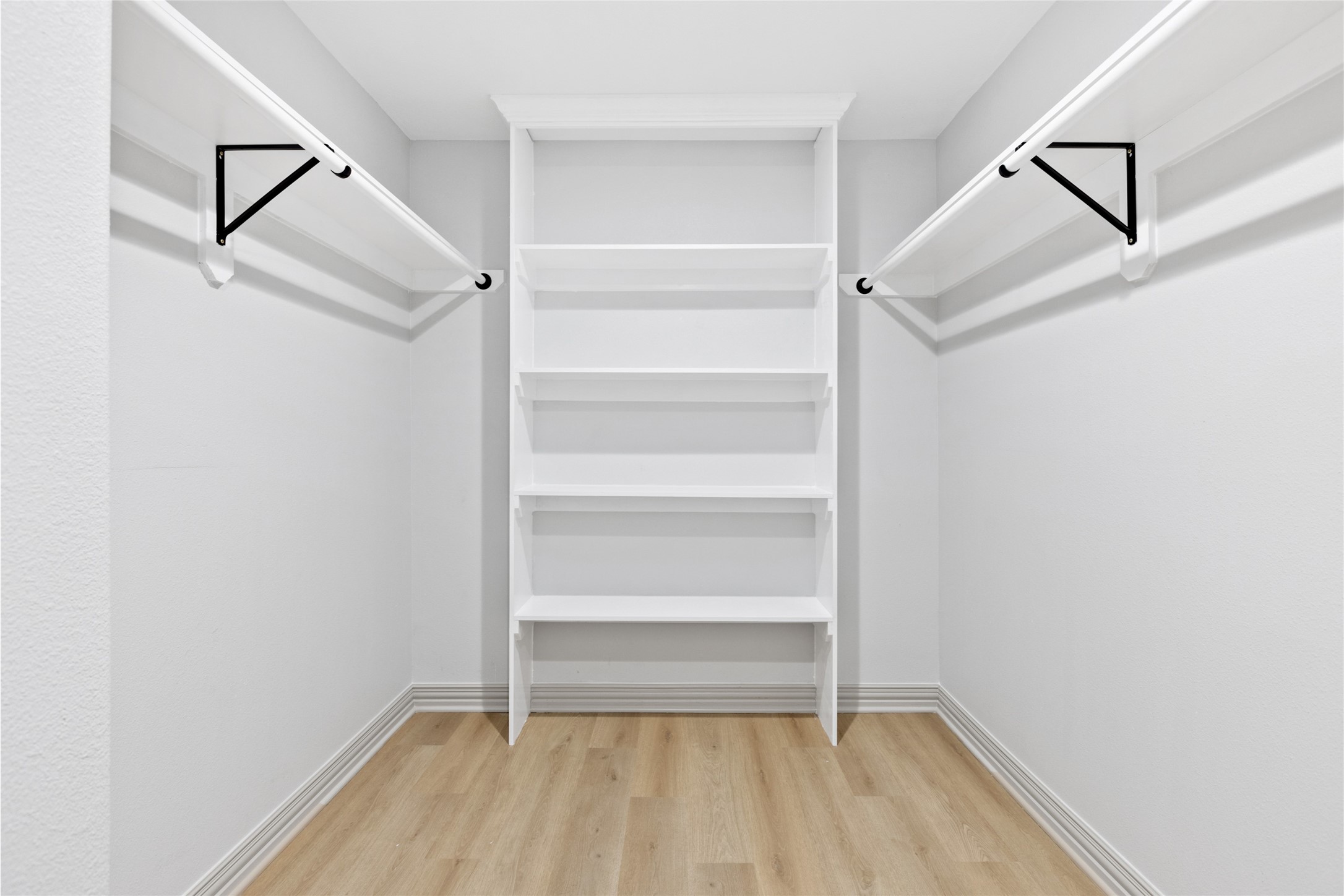 925 County Road 737B Alvin, TX 77511 - Photo 17 of 28 Second, larger closet, in the primary bedroom.