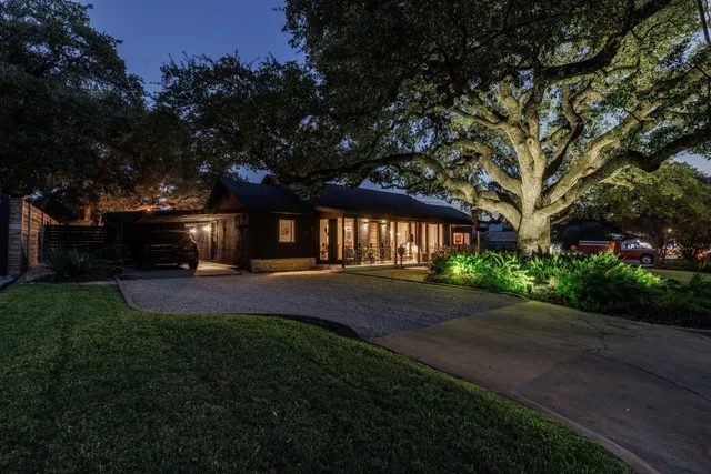 a living room with large windows