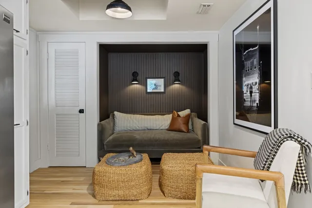 a living room with furniture and a window