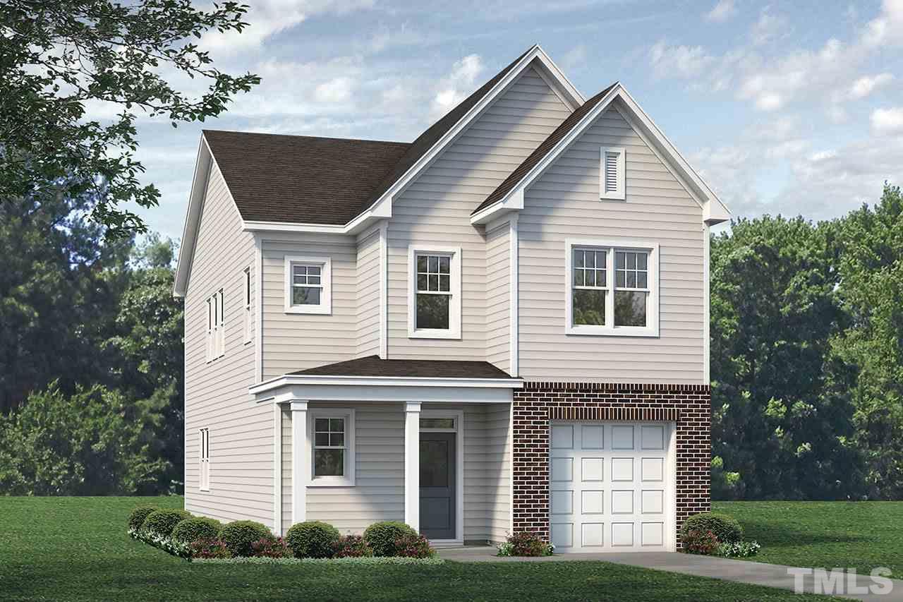 3713 Putman Road Raleigh, NC 27610 - Photo 1 of 1 a front view of a house with garden