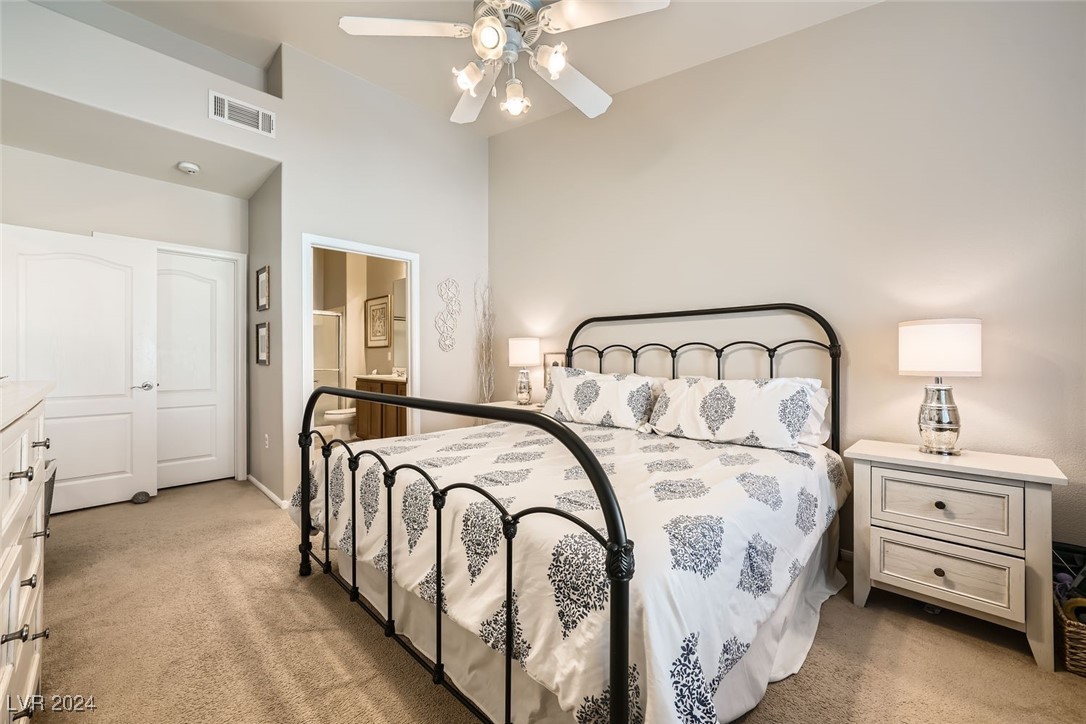 8985 South Durango Drive, Unit 2117 Las Vegas, NV 89113 - Photo 14 of 24 Primary Bedroom with its own en suite Full Bathroom with Dual Sinks