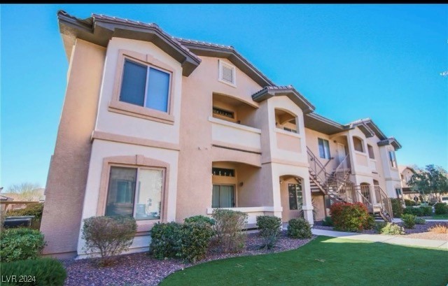 8985 South Durango Drive, Unit 2117 Las Vegas, NV 89113 - Photo 2 of 24 Exterior photo; Unit is located upstairs