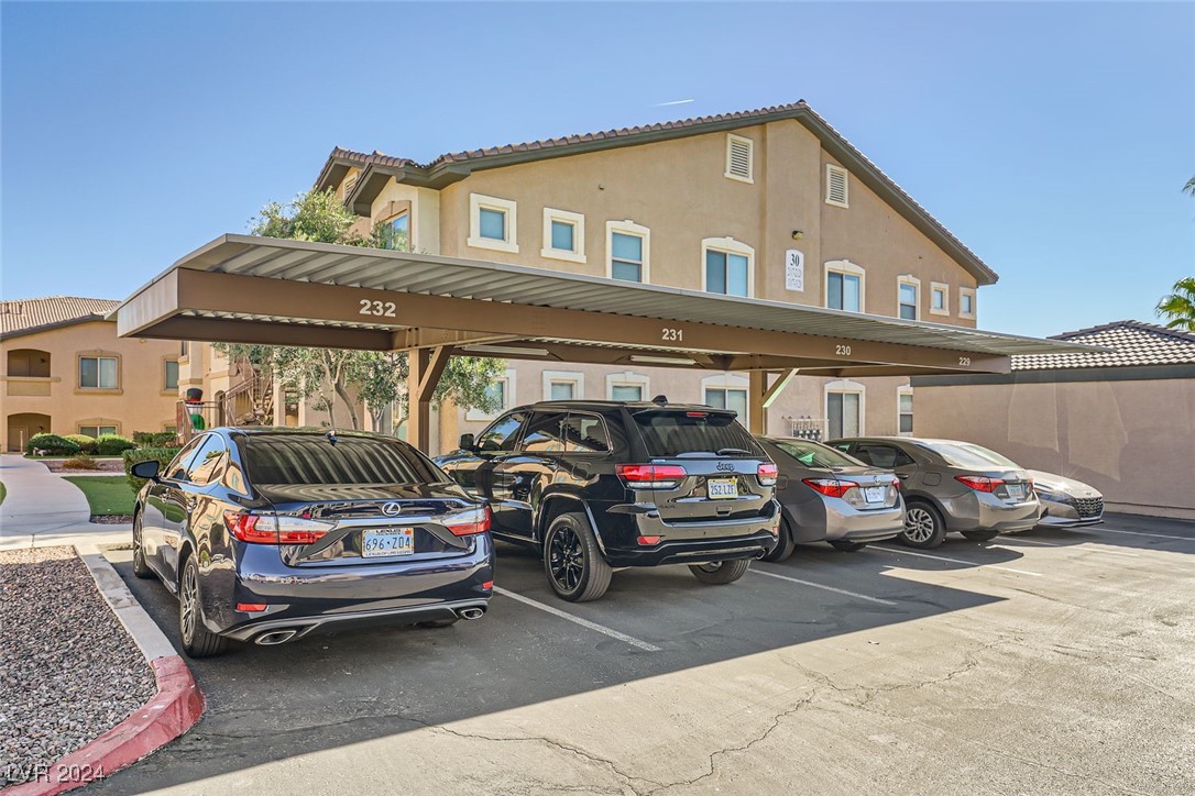 8985 South Durango Drive, Unit 2117 Las Vegas, NV 89113 - Photo 24 of 24 1 Carport/Covered Assigned Parking Space with plenty of additional parking nearby!