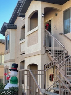 8985 South Durango Drive, Unit 2117 Las Vegas, NV 89113 - Photo 3 of 24 Stairwell leading up to Condominium