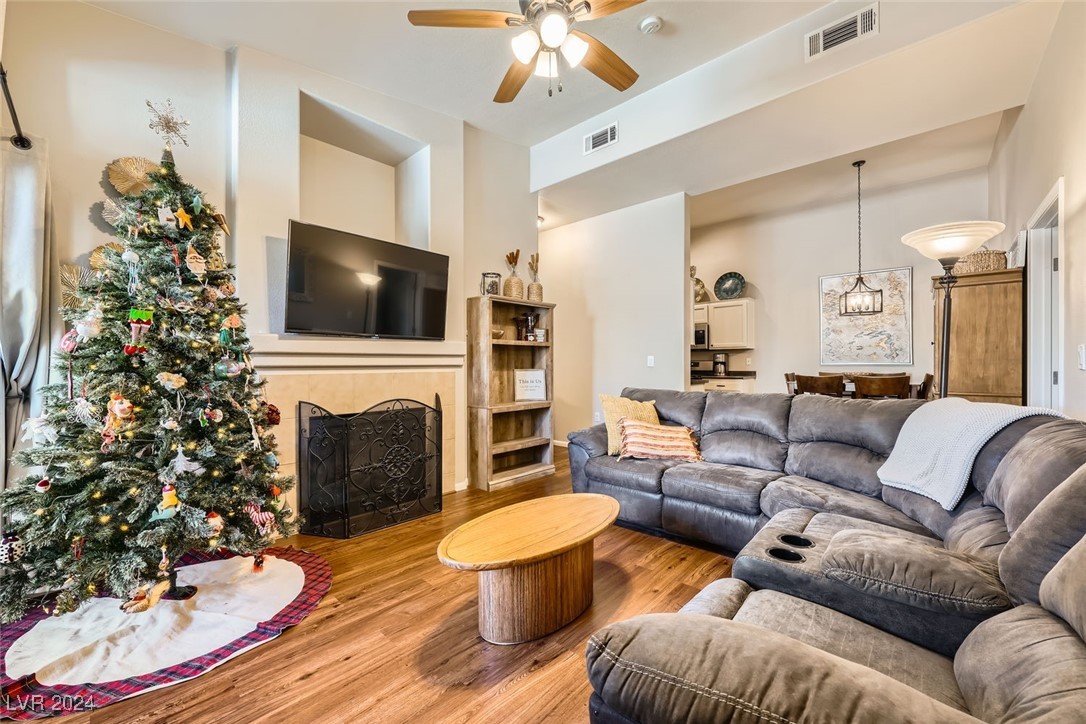 8985 South Durango Drive, Unit 2117 Las Vegas, NV 89113 - Photo 8 of 24 Living Area with view of Dining & Kitchen entry