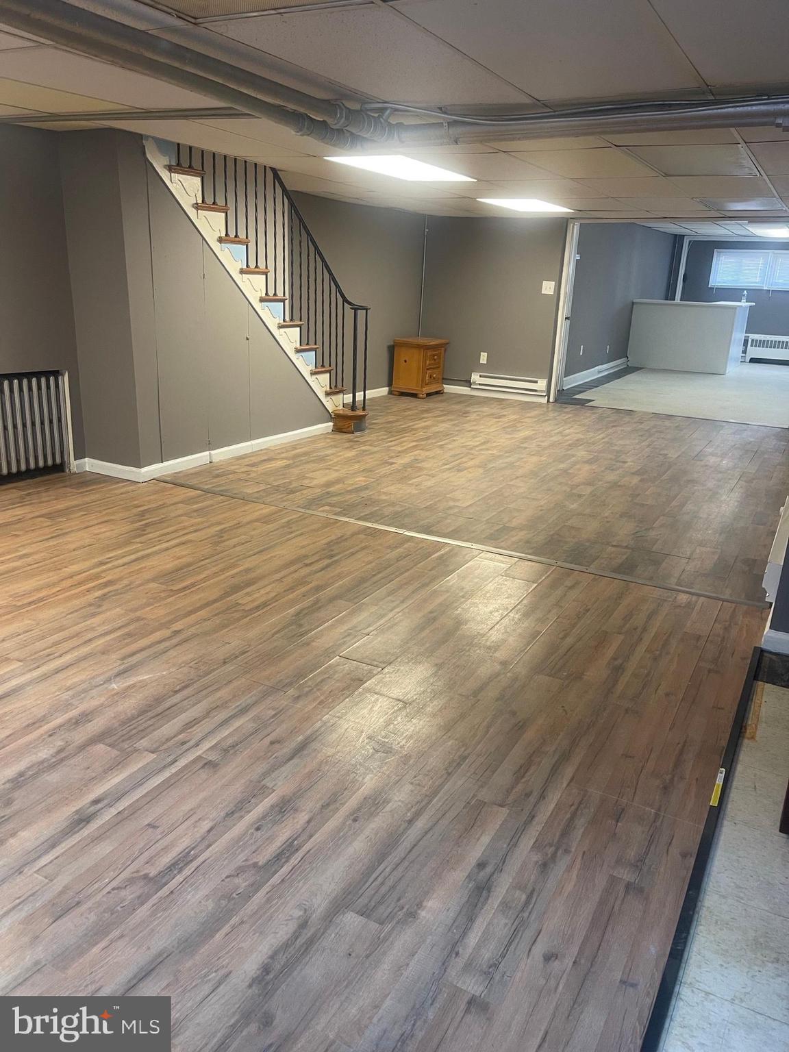 234 Long Lane Upper Darby, PA 19082 - Photo 11 of 29 a view of a hallway with wooden floor
