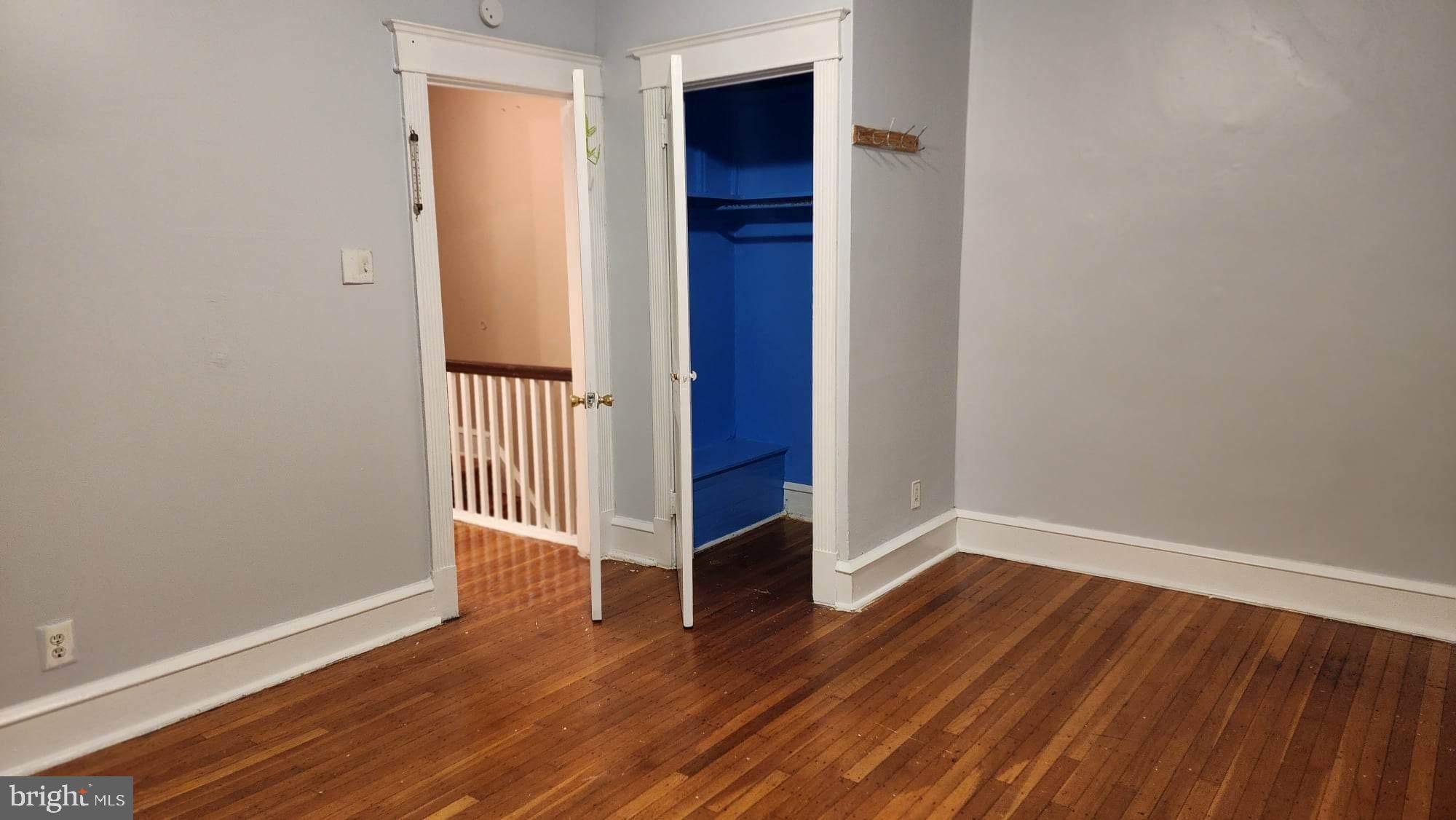 234 Long Lane Upper Darby, PA 19082 - Photo 12 of 29 a view of a room with wooden floor and closet