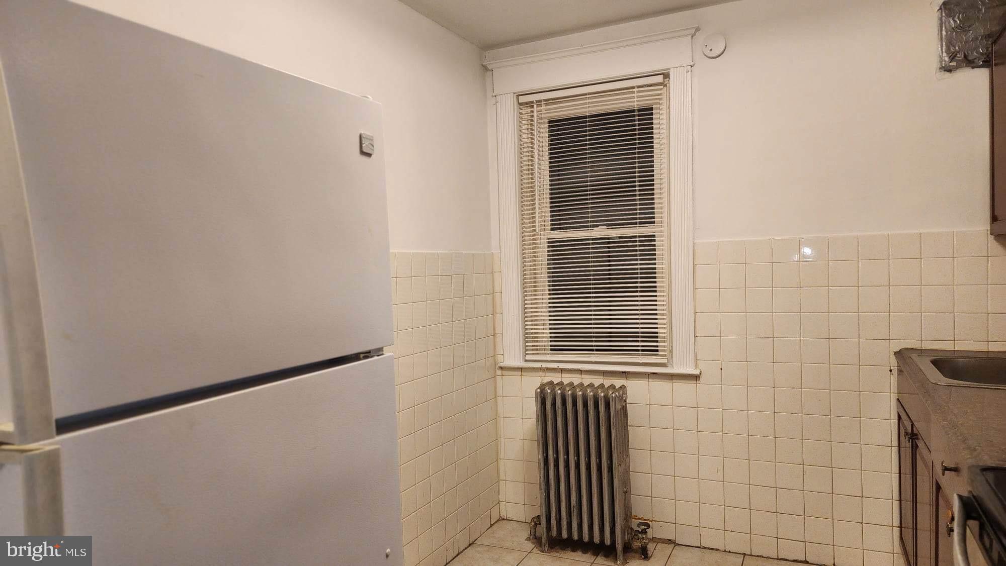 234 Long Lane Upper Darby, PA 19082 - Photo 19 of 29 a view of a door and chair