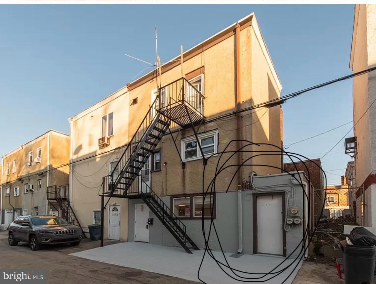 234 Long Lane Upper Darby, PA 19082 - Photo 4 of 29 a view of a car park side of a street