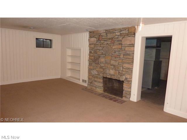 8024 Callow Road Painesville, OH 44077 - Photo 9 of 22 Second of two fireplaces this one in the family room in lower level