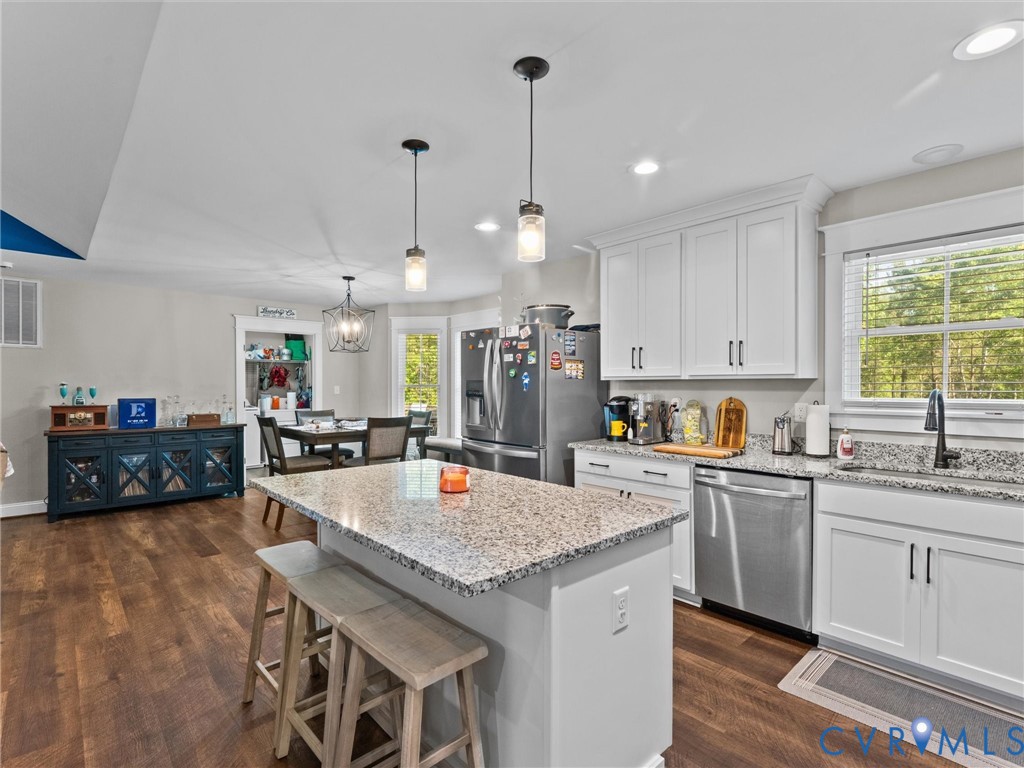 10819 Vaughan Road Petersburg, VA 23805 - Photo 29 of 45 Kitchen island with a light-colored countertop, pe