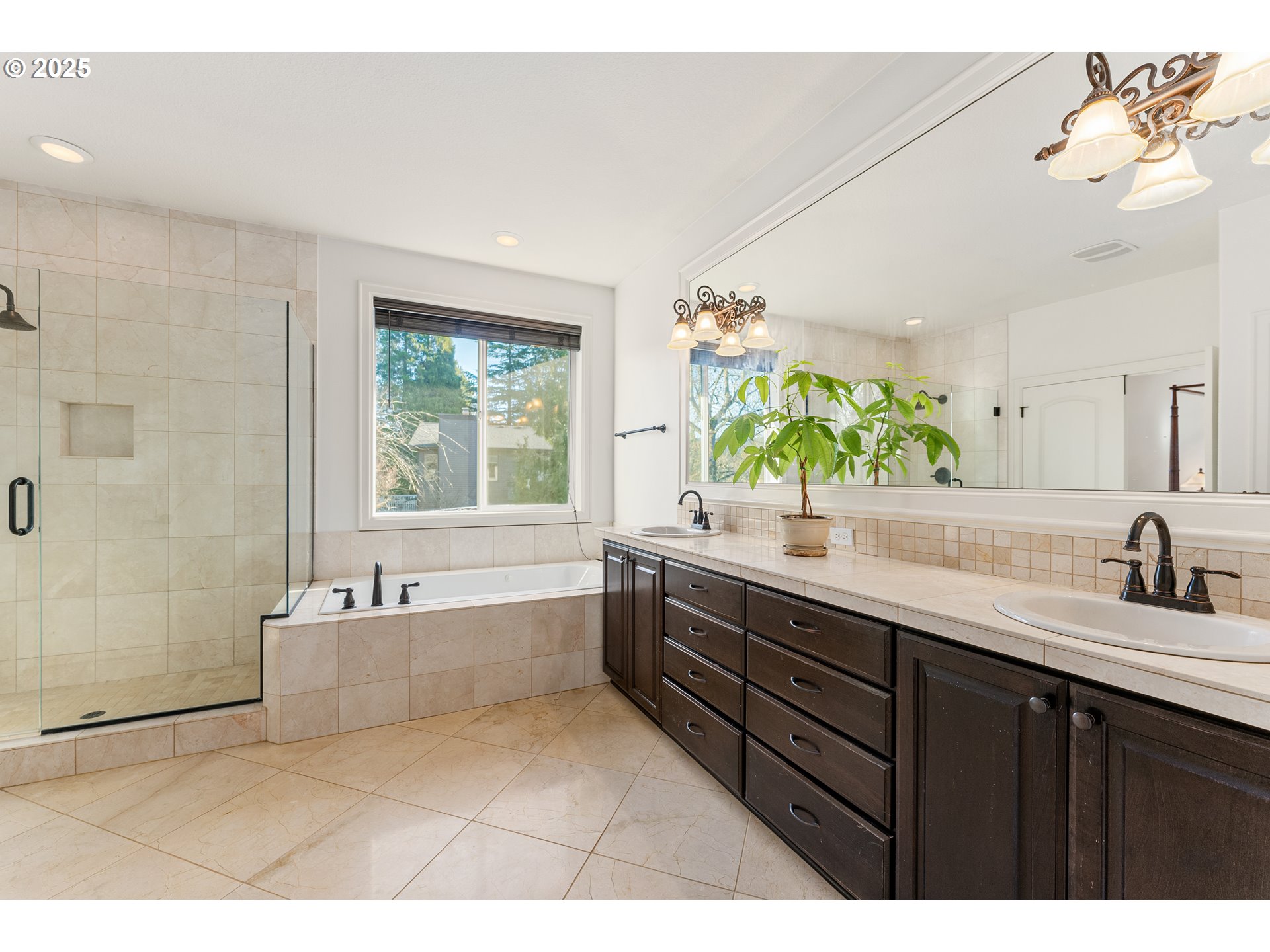 3356 Northwest 153rd Terrace Portland, OR 97229 - Photo 18 of 37 a bathroom with a tub sink and mirror