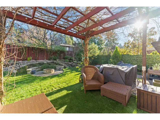 a view of yard with patio