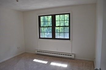 69 Spencer Road, Unit 34J Boxborough, MA 01719 - Photo 7 of 7 an empty room with a window