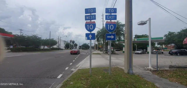 a city street lined with tall buildings