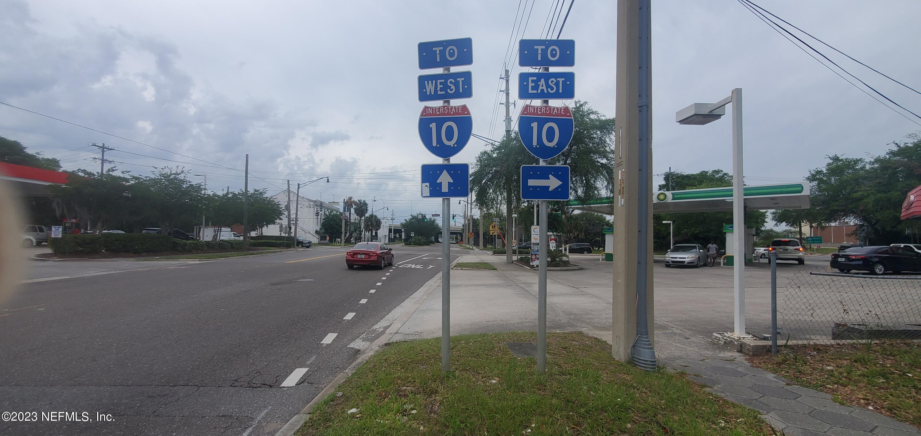 2363 Gilmore Street Jacksonville, FL 32204 - Photo 5 of 8 a city street lined with tall buildings
