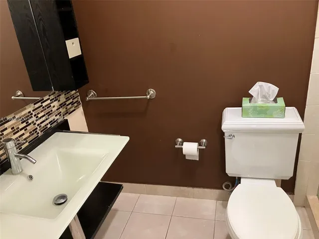 a view of a house with pool and chairs