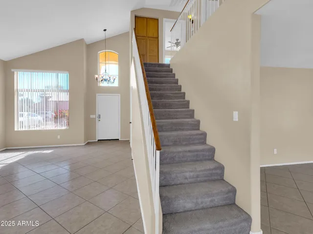 a view of an entryway with staircase
