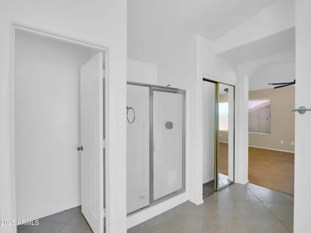 a view of a bedroom with closet