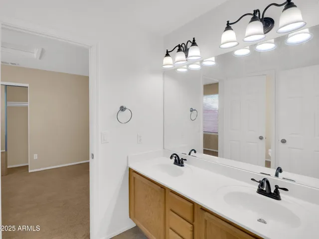 a white toilet sitting next to a bath tub