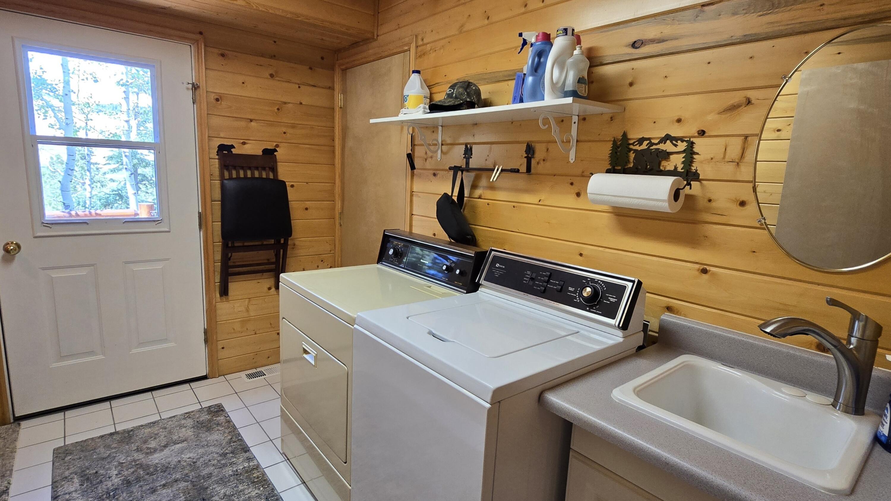 650 South Ridge Point Drive Panguitch, UT 84759 - Photo 15 of 38 Laundry Room w/sink & outside entrance. Perfect to drop muddy shoes or snowboots.