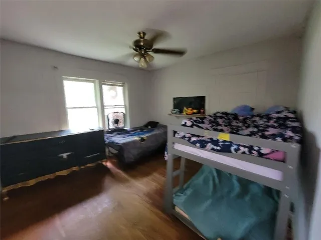 a kitchen with stove and cabinets
