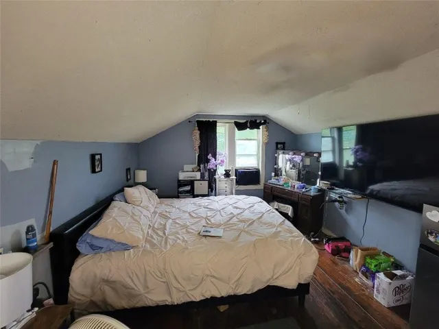 a view of a house with sitting area and garden
