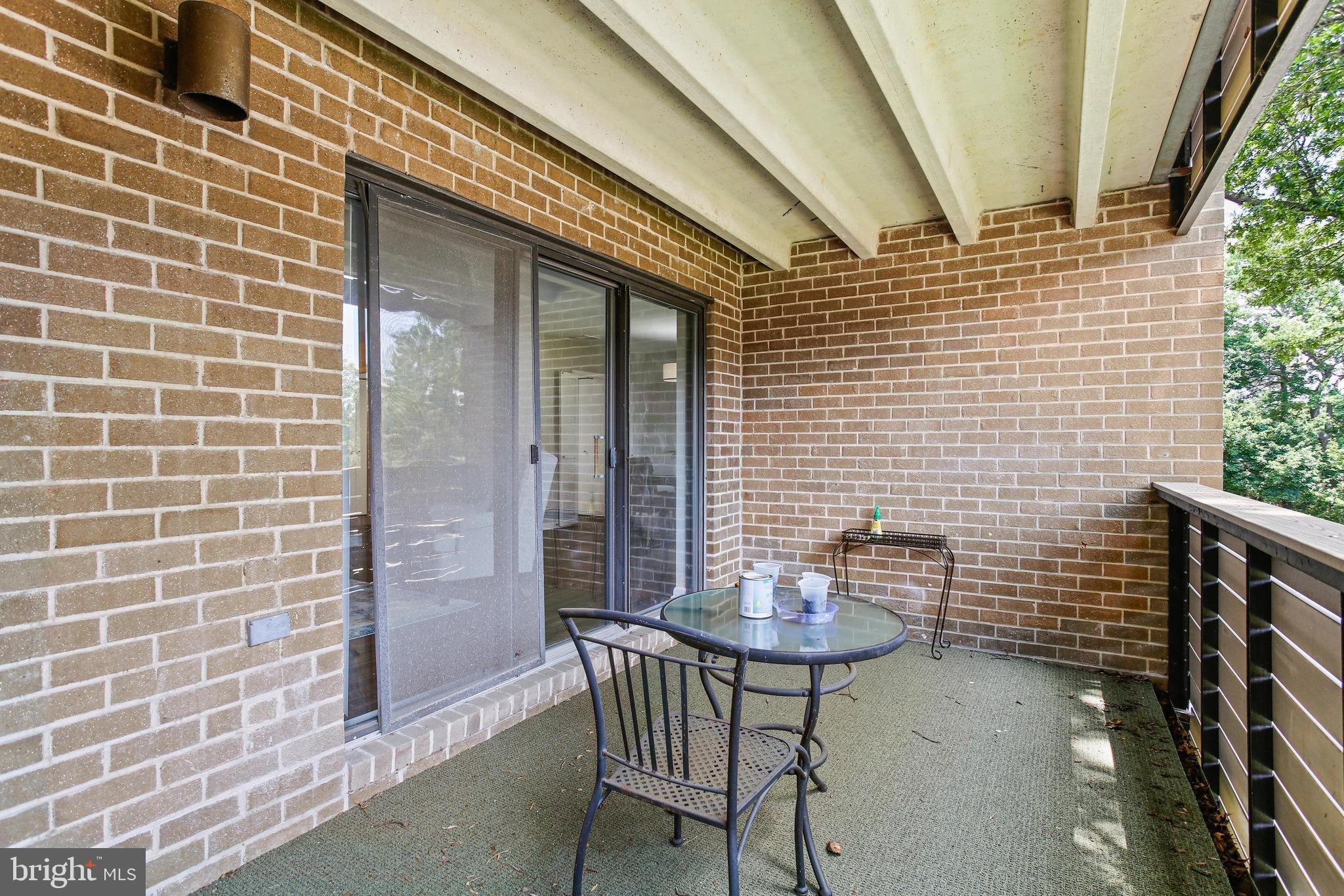4 Candlemaker Court, Unit 301 Baltimore, MD 21208 - Photo 28 of 32 a view of a outdoor seating area