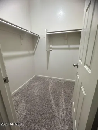 a view of a room with rack on the wall