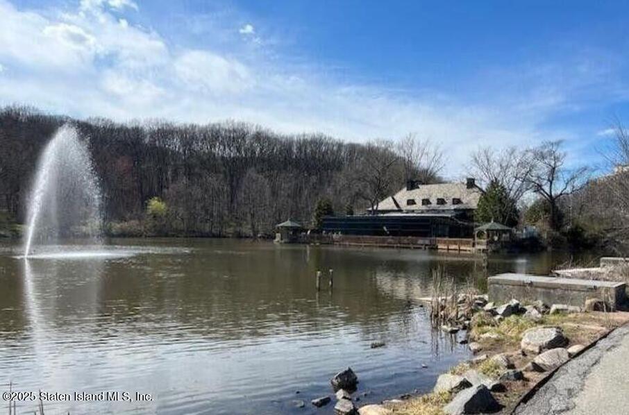 1100 Clove Road, Unit 2N Staten Island, NY 10301 - Photo 25 of 27 a view of a lake with houses