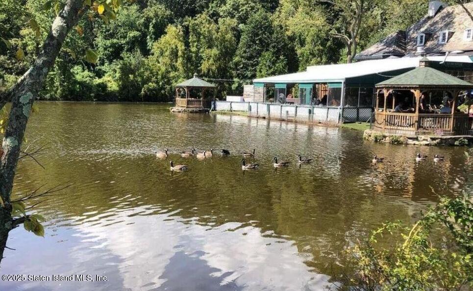 1100 Clove Road, Unit 2N Staten Island, NY 10301 - Photo 26 of 27 a view of a lake with a patio