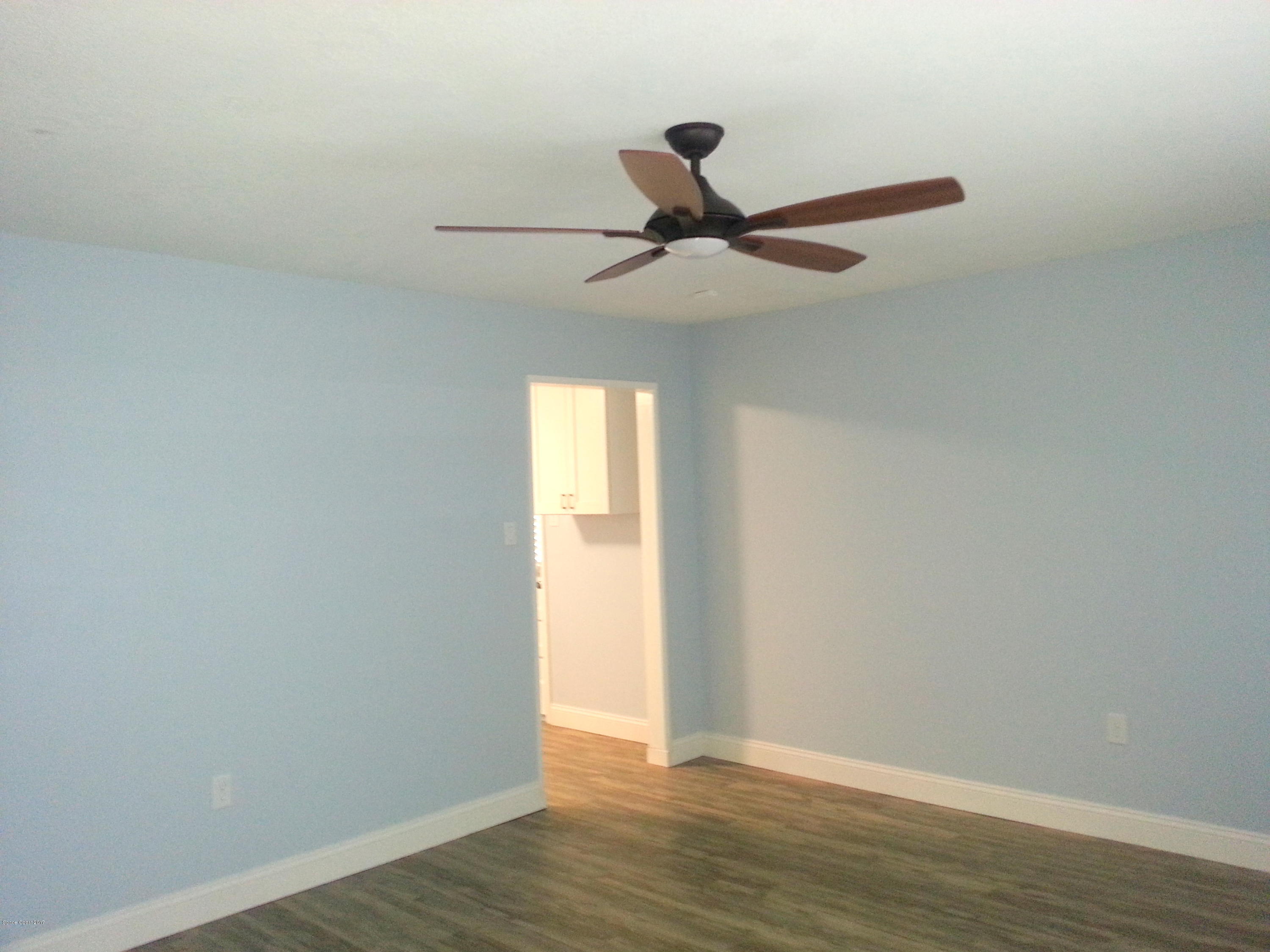 1020 Cherokee Road Southeast Palm Bay, FL 32909 - Photo 15 of 28 New Floors-Paint-Fans