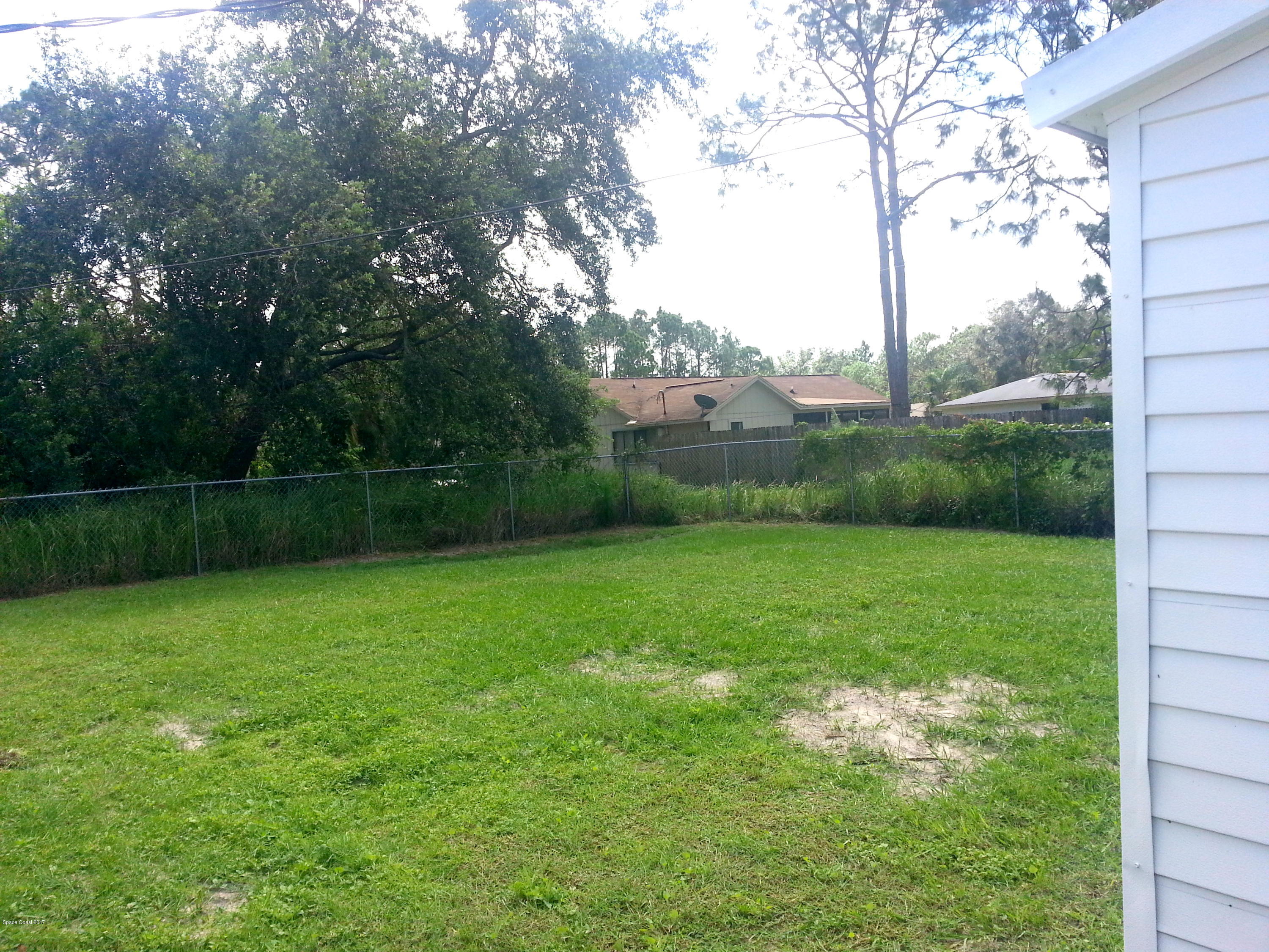 1020 Cherokee Road Southeast Palm Bay, FL 32909 - Photo 24 of 28 Large Private Fenced Yard