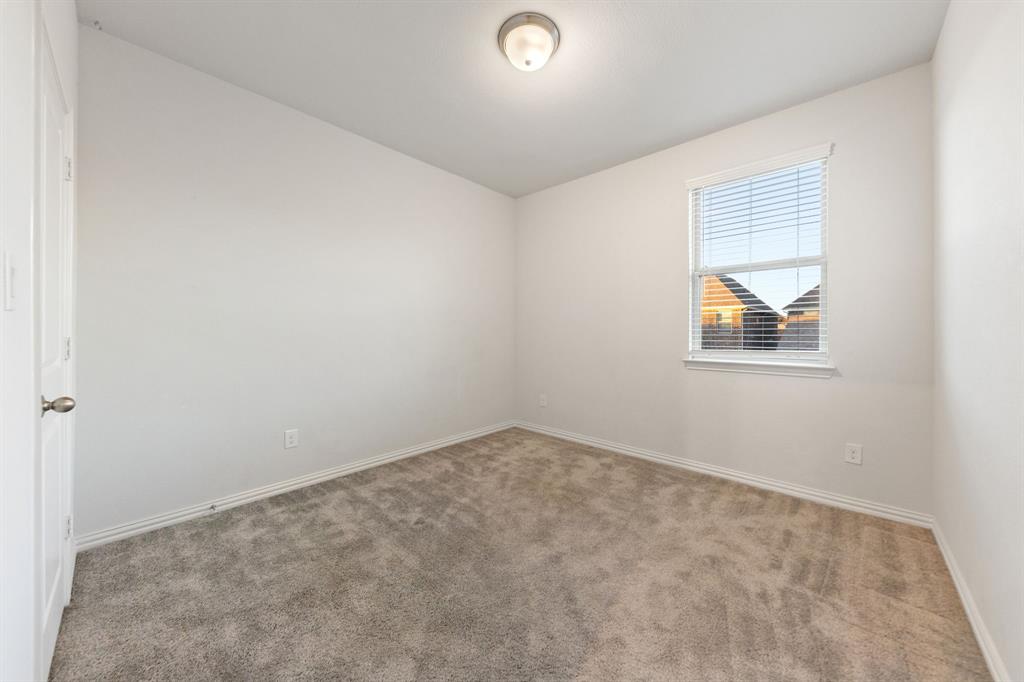 7505 Sunset Boulevard Rowlett, TX 75088 - Photo 20 of 33 an empty room with windows
