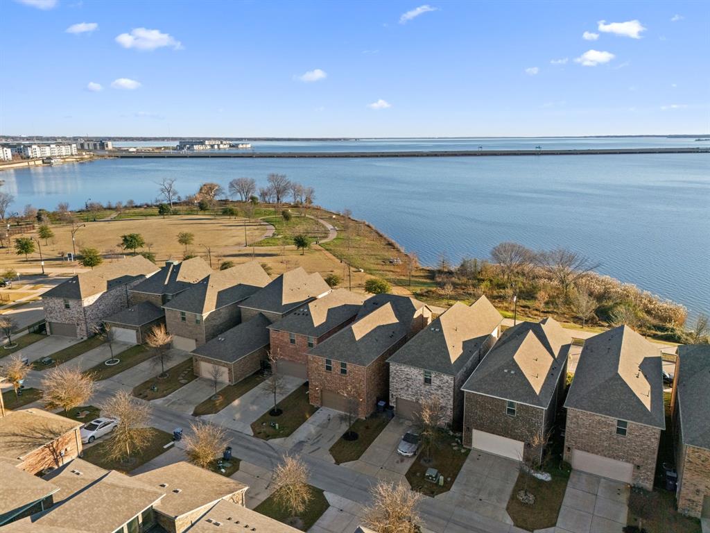 7505 Sunset Boulevard Rowlett, TX 75088 - Photo 32 of 33 a view of an ocean and beach