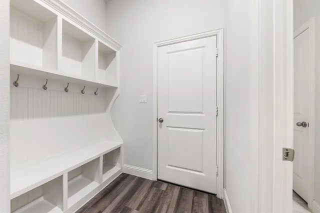 a view of an empty walk in closet