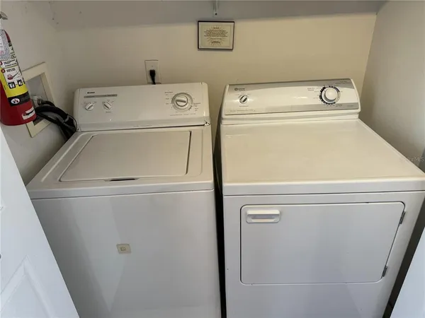 a view of table and chair in wooden floor