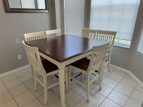 a utility room with sink washer and dryer