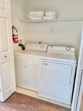 a utility room with dryer and washer